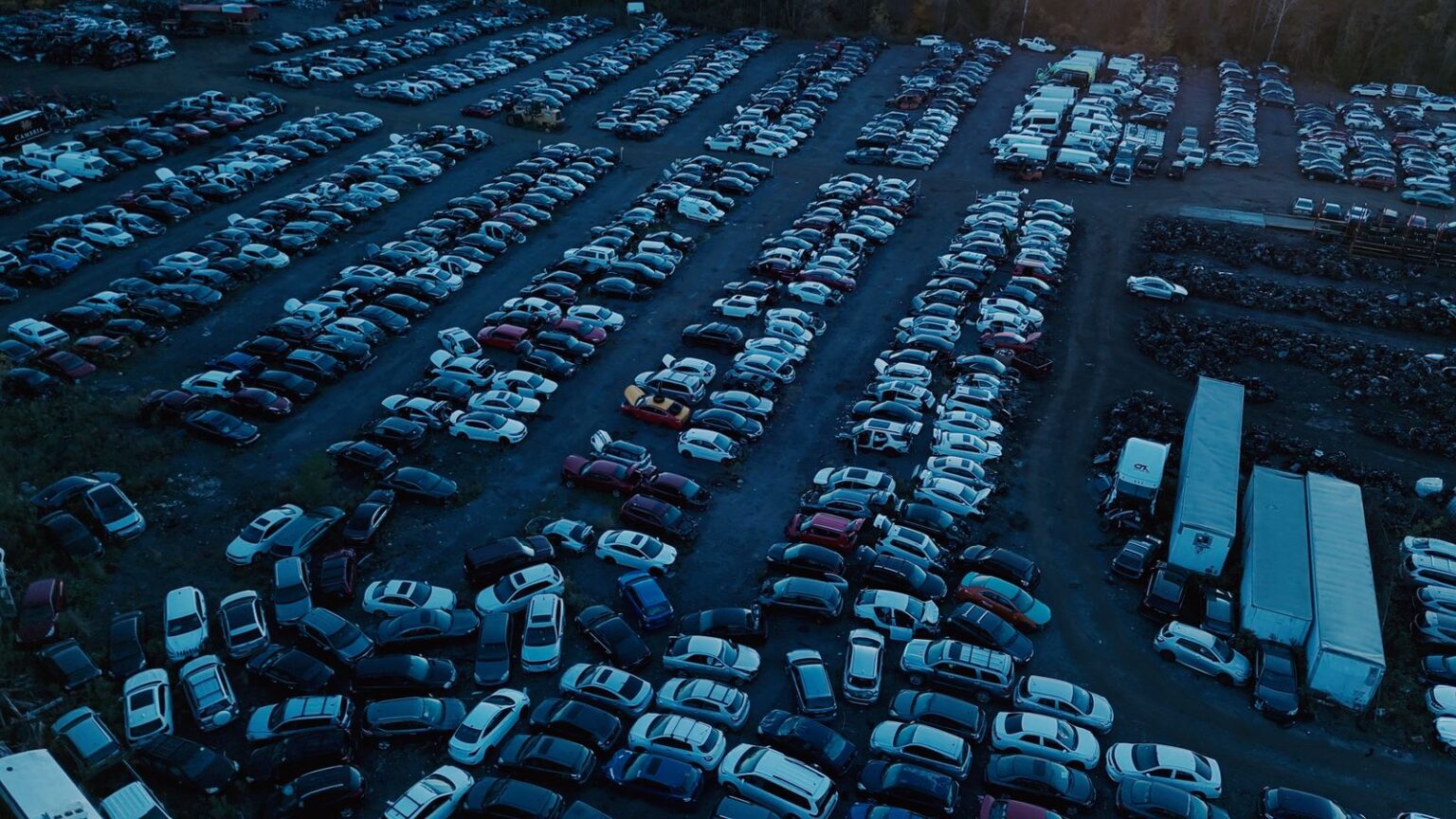 Rows of scrap cars and storage trailers at the GTA Auto Recycling yard in Clarington, seen from the air
